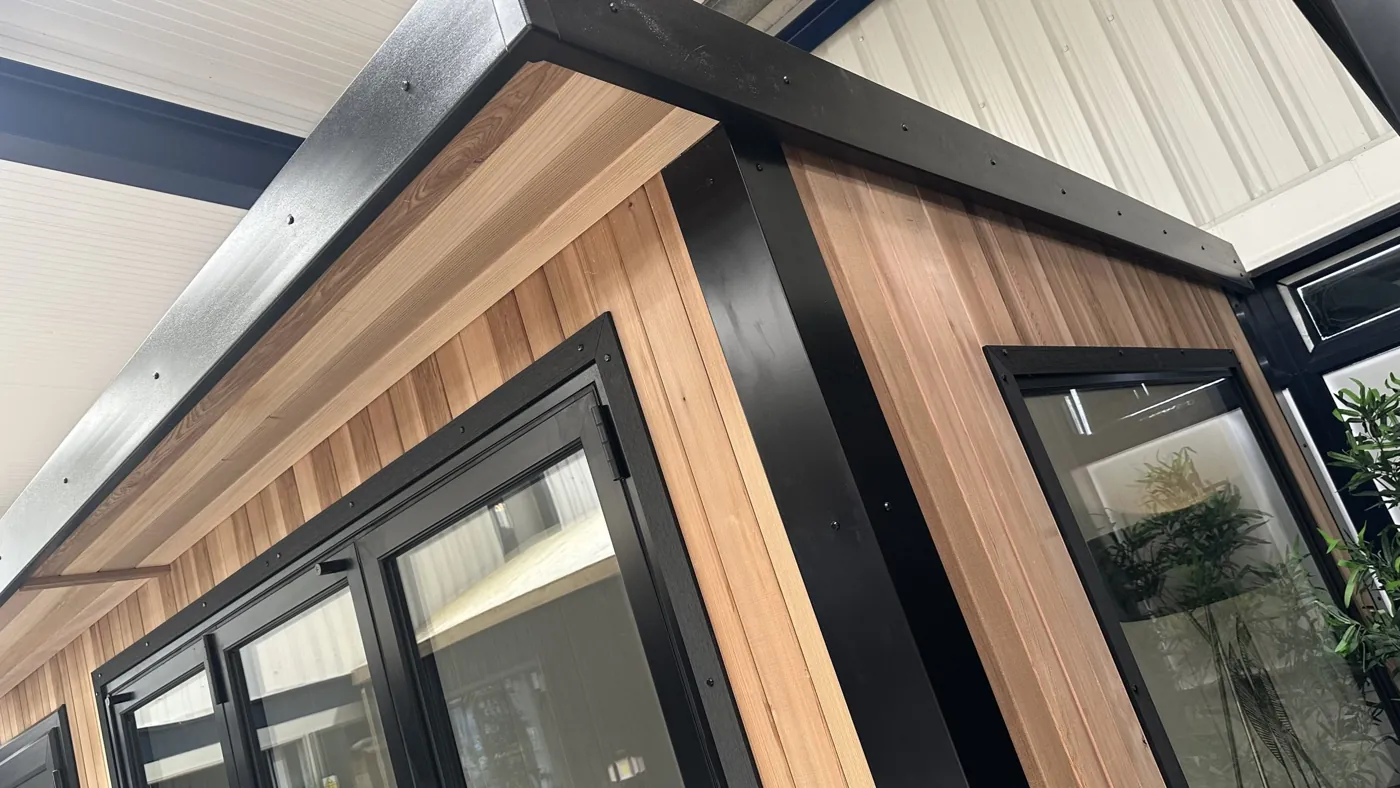 Cedar cladding, black trims and glazing on a Noah garden room