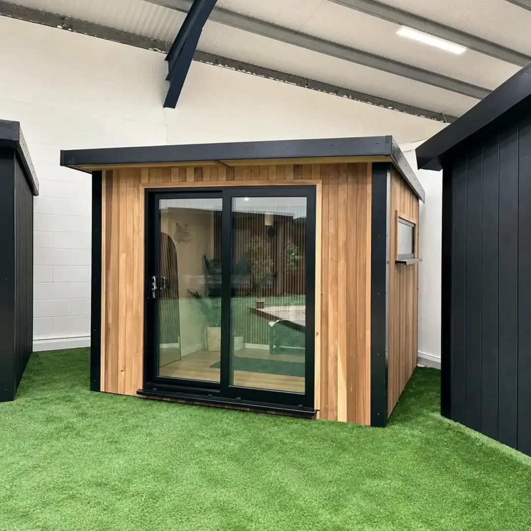 Cedar-clad display garden room inside the Noah indoor showroom